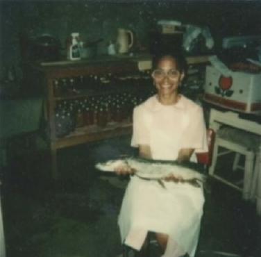 Myrtle Owens with Fish and Canned Goods